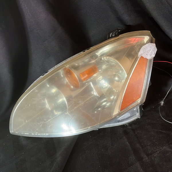 02 Nissan Altima left side headlight